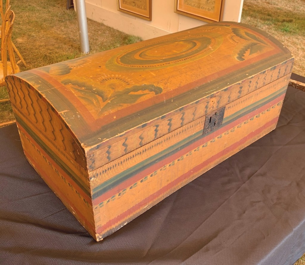 The top lot of the auction was this paint-decorated dometop trunk that sold for $7,500 to the trade. It was a lone consignment from a collector who had purchased it at an onsite Vermont auction in 1982.