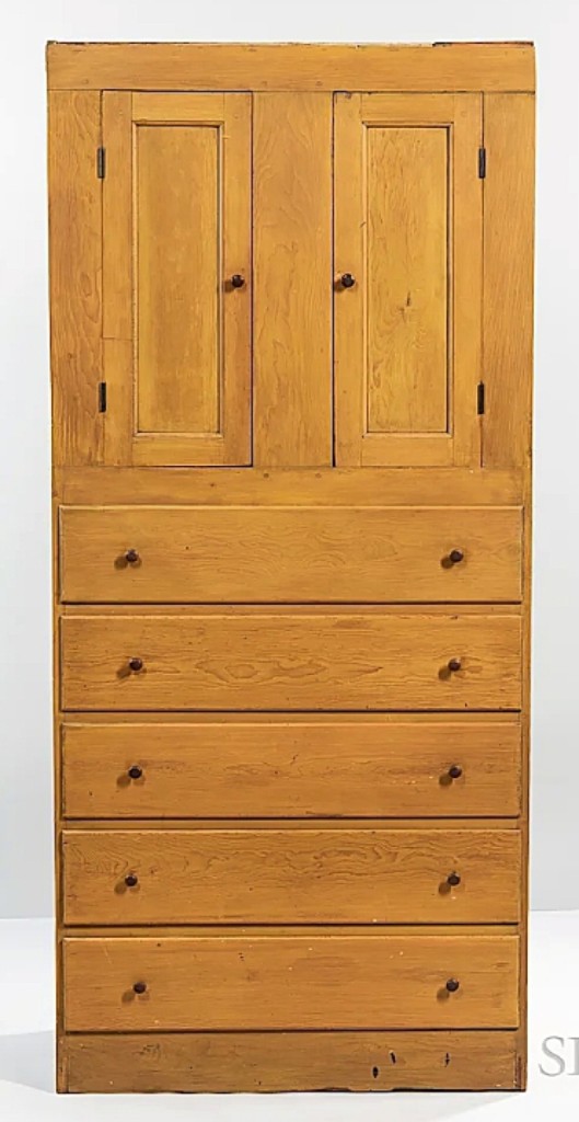 The sale’s top lot was found at $9,375 for this yellow-painted cupboard over drawers from either Hancock, Mass., or New Lebanon, N.Y. It was inscribed to the bottom “[N/W]CB March 21, 1840.”