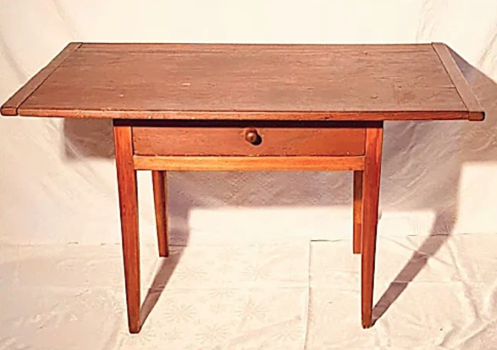 The Nickersons also offered an American Hepplewhite tavern table in pine and cherry, circa 1780.