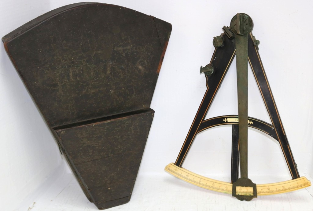 Of the numerous marine navigating instruments, an early octant inlaid with whalebone and ebony, with a scrimshawed dial, went out at $11,115.