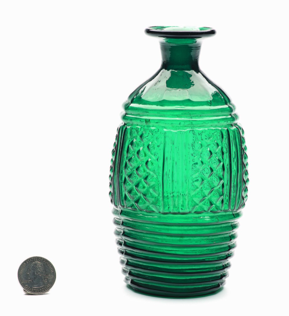 A blown three-mold decanter, probably from England, 1815-30, finished at $5,850.