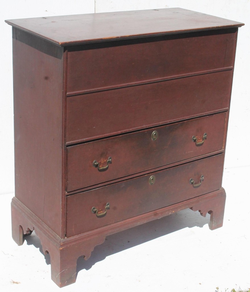 “I think that was the best buy of the night,” Reuling said of this Eighteenth Century two-drawer lift-top blanket chest in original untouched red paint. It brought $1,722 from an online bidder ($ ,000).