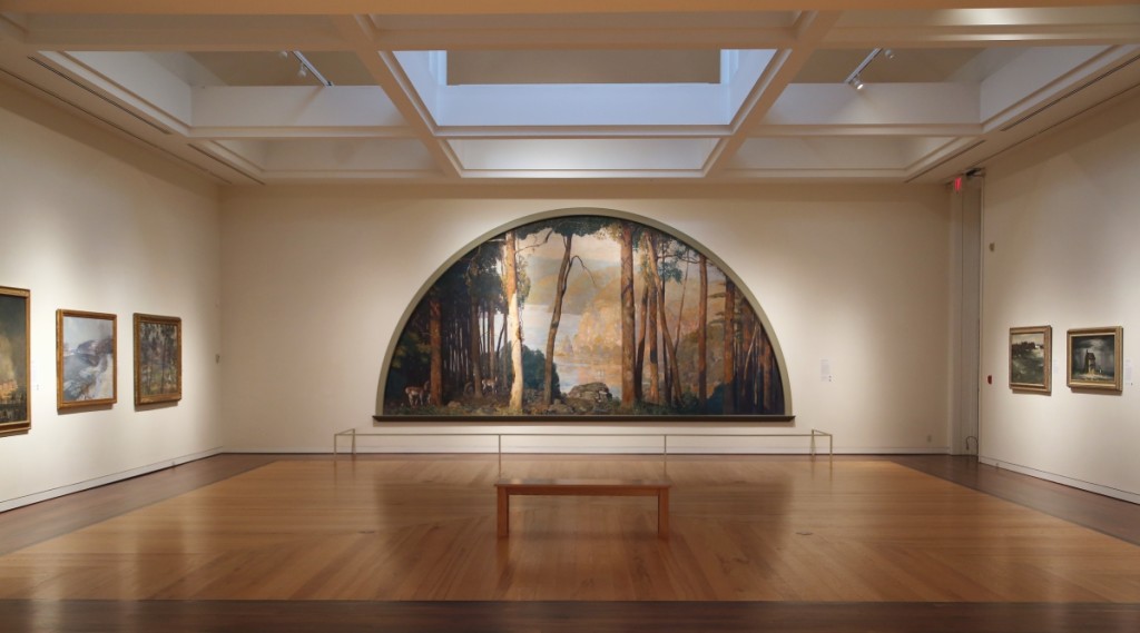 Daniel Garber’s “A Wooded Watershed” was originally commissioned for the 1926 Sesquicentennial Exhibition in Philadelphia. The view features the Delaware River Gap in its pristine form, without any human presence at all.