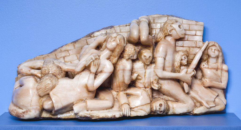 “See, Speak, Hear, Yet the Bullets Continue / Ver, hablar, escuchar, mientras tanto las balas continúan,” by Román Villarreal (b 1950, American), 1998. Alabaster, 13¼ by 27 by 9½ inches. National Museum of Mexican Art Permanent Collection. A gift to the world on behalf of Román and María Villarreal. Photo credit Michael Tropea.