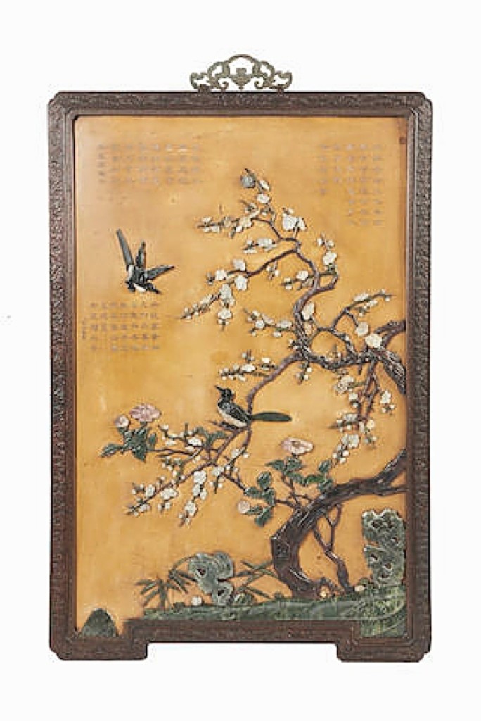 A pair of Chinese jade and hardstone overlay lacquer panels, Imperial workshops, Eighteenth Century, brought $387,575.