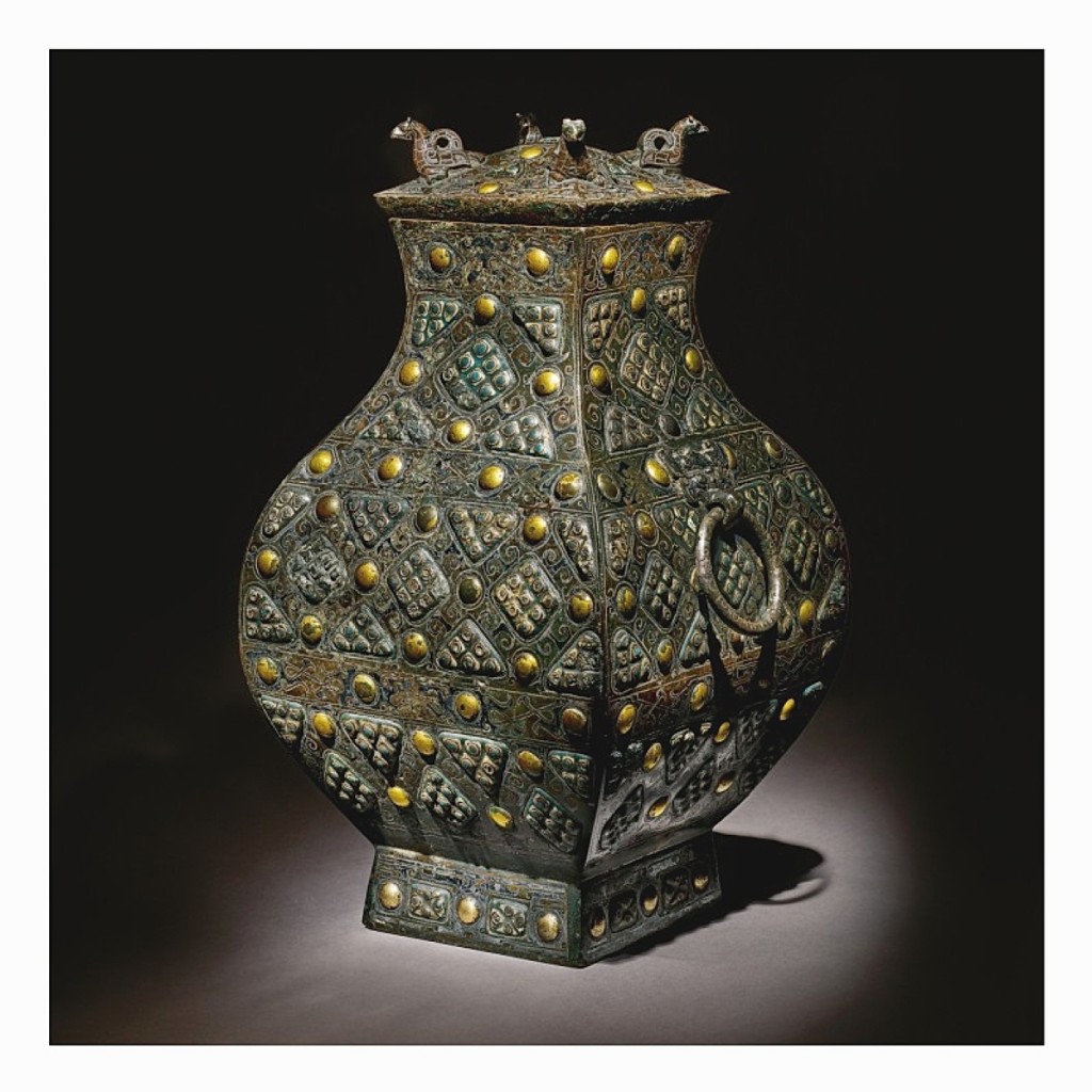 This rare and important gold, silver and glass-embellished bronze vessel sold for $8.3 million (Chinese Works of Art).