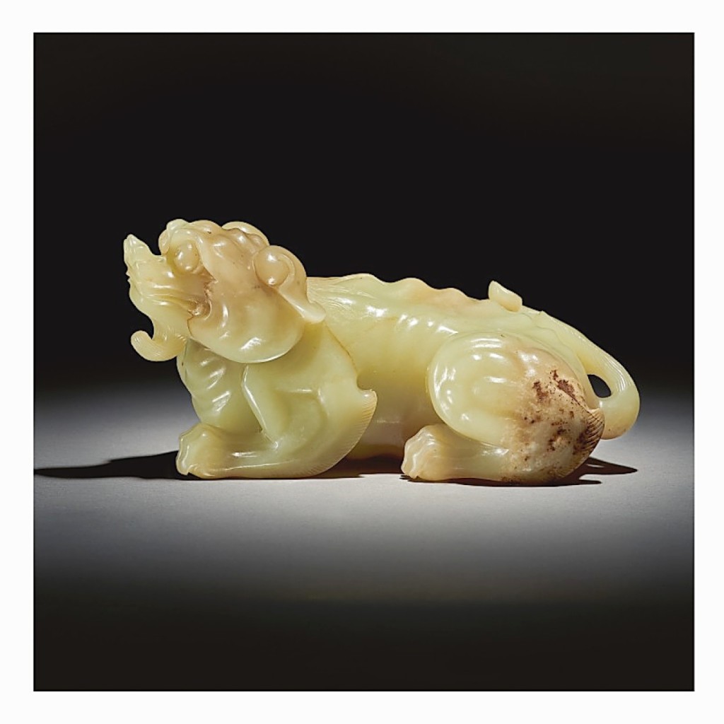 This large yellow and russet jade carving of a mythical beast sold for $1.7 million (Junkunc Collection).