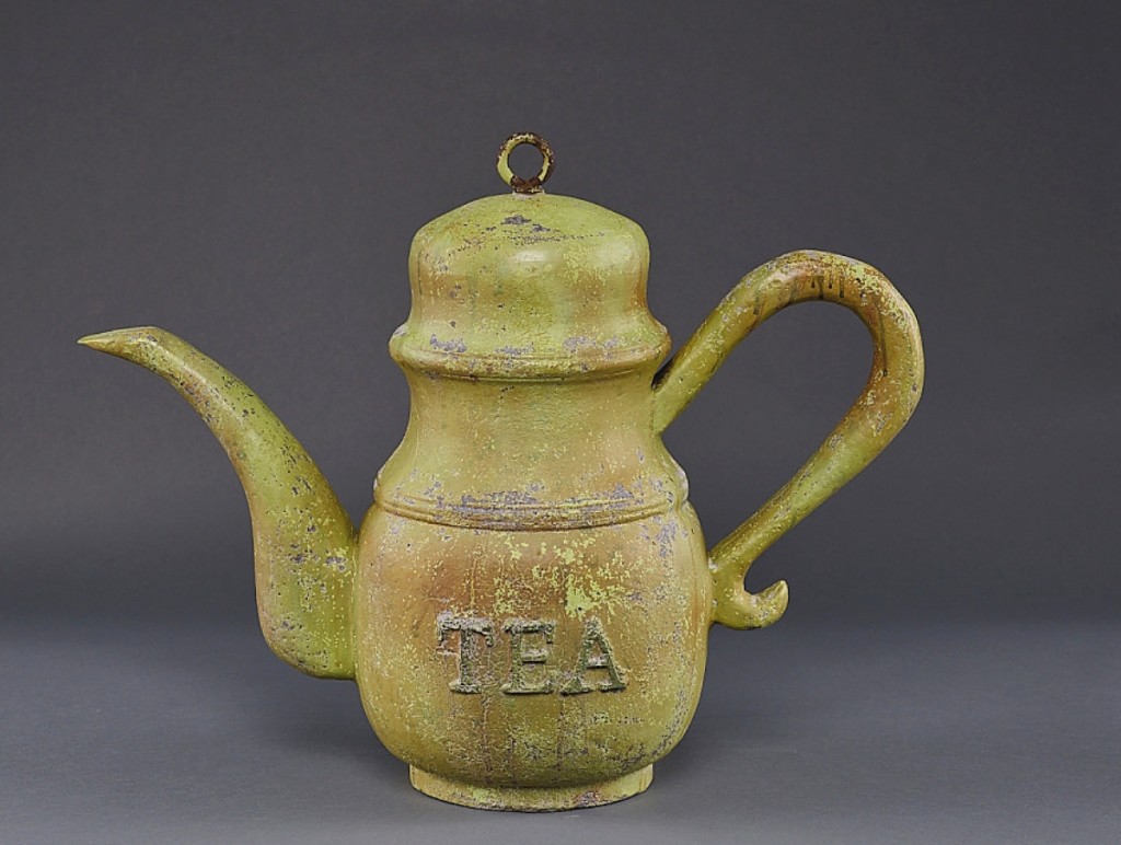 In solid cast aluminum, Upperville, Va., dealer Thistlethwaite Americana sold this tea shop trade sign with painted verdigris surface from the 1920s. It had provenance to Steven Score.