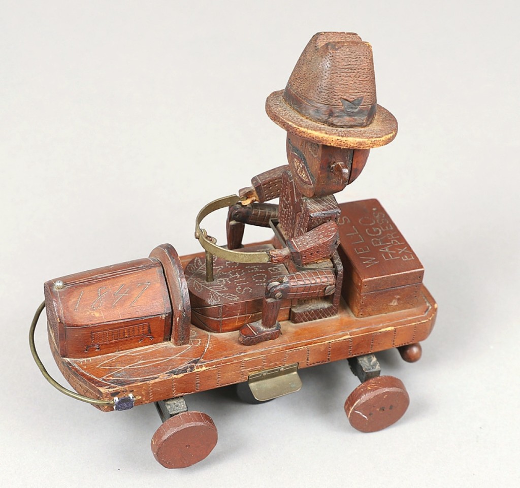 Interest in folk art extended to this Union veteran mechanical pull toy from Togus, Maine. It features a Wells Fargo Express car with the inscription “Hobby Shop, Togus, Me” and dated 1847. The car sold from Jeffrey Tillou Antiques, Litchfield, Conn.