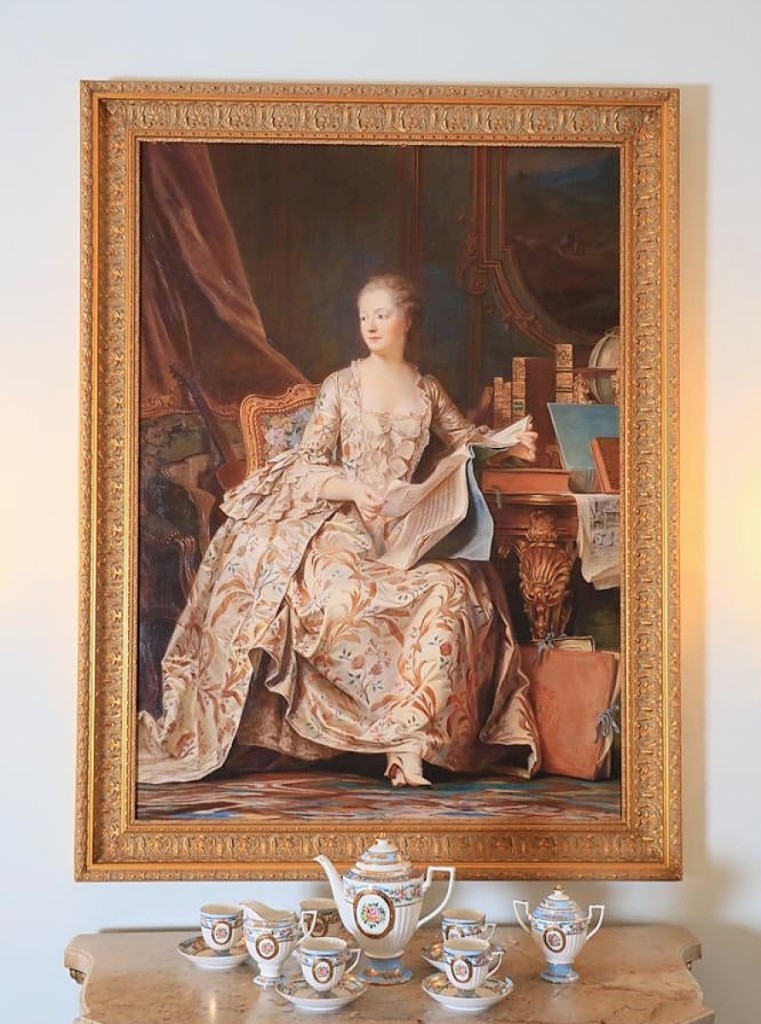 From the Royal Suite, a French-style portrait of a woman with sheet music realized $17,500.