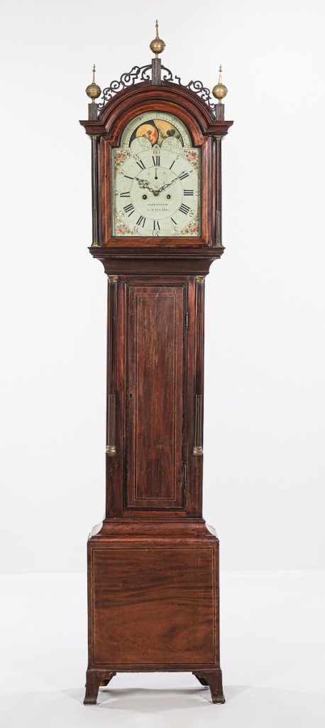 Selling for $28,750 was this Simon Willard inlaid mahogany tall clock. The case was attributed to Thomas Seymour of Roxbury, Mass., and it dated to 1795. It came with its untouched original label for Willard, which was printed by Isaiah Thomas Jr in Worcester, Mass.
