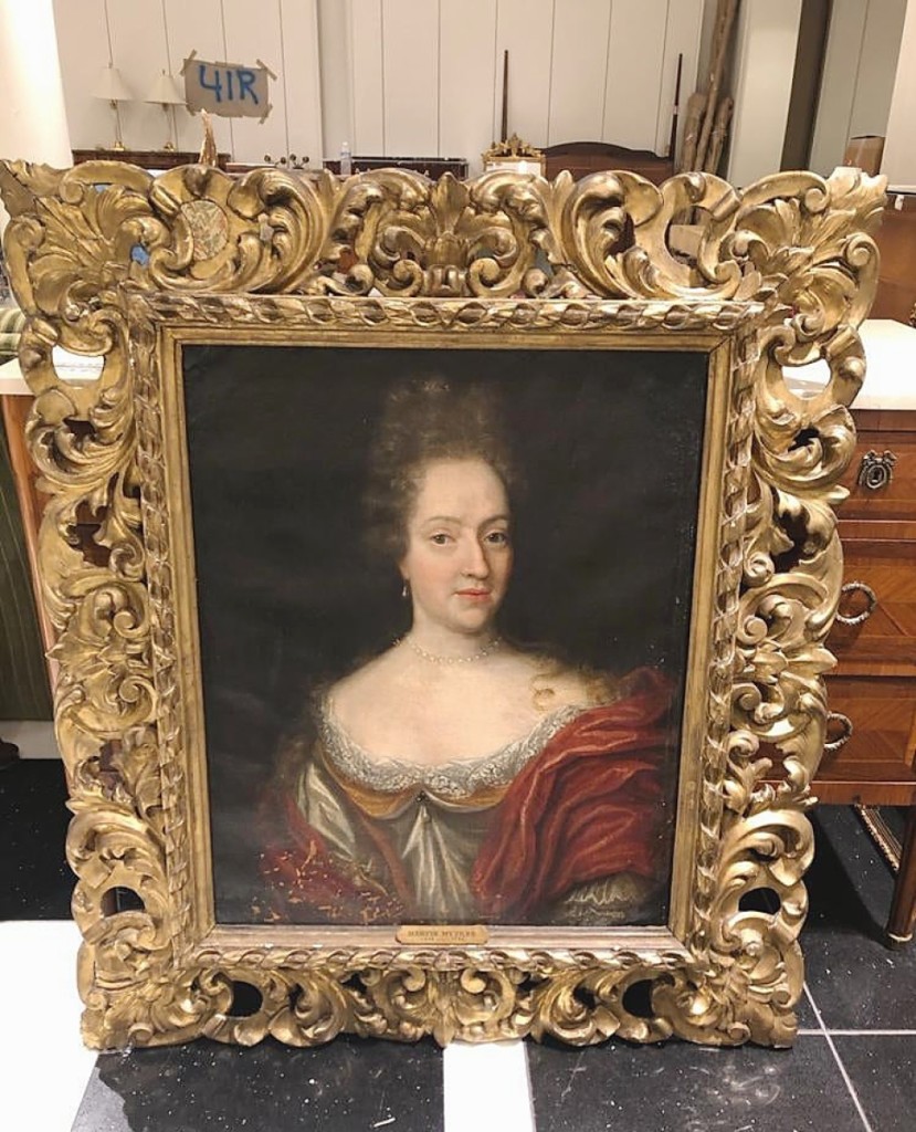 Although many rooms in the hotel had paintings, those in the Royal Suite brought the highest prices. Cataloged simply as an Eighteenth Century portrait of a noble woman in a red and ivory dress inside an elaborately carved gilt wood frame, it realized $22,500. The frame was labeled Martin Mytens.