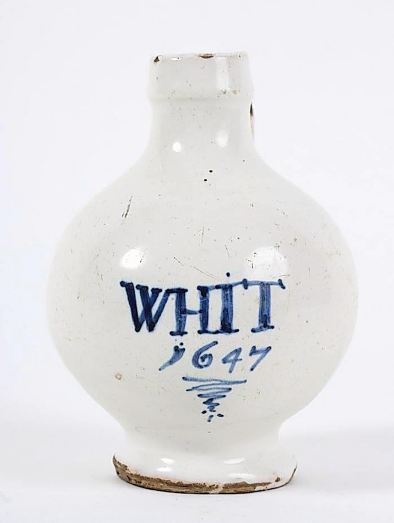 One of the earlier pieces of ceramics in the sale was this white-glazed stoneware jug, 6 inches tall, with the date 1647 in blue. It realized $9,600.