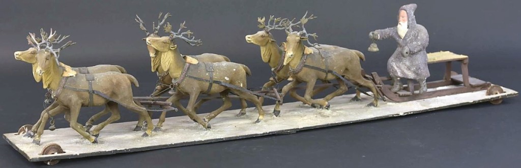 The sale’s top lot sold for $72,000 above a $1,500 estimate: a santa on sleigh pulled by six reindeer, all on a wheeled platform. Bertoia had never handled another example with six reindeer, though they had seen another with four. Jeanne Bertoia remarked that the detail to the reindeer was remarkable.