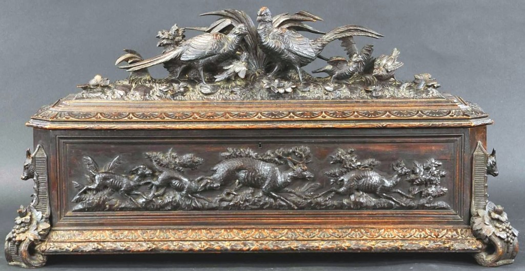 This Swiss mandoline box was the top lot from a collection of music boxes. It was housed within a finely carved Black Forest case with two pheasants on the lid and sold well above estimate for $31,200.