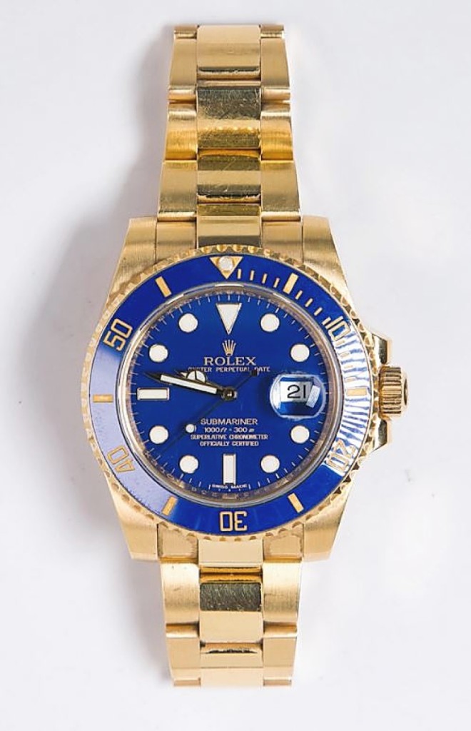 Gold and royal blue have been a winning pair since Ancient Egypt and earlier, so it was no surprise when this Rolex Submariner in 18K yellow gold sold above estimate for $29,520.