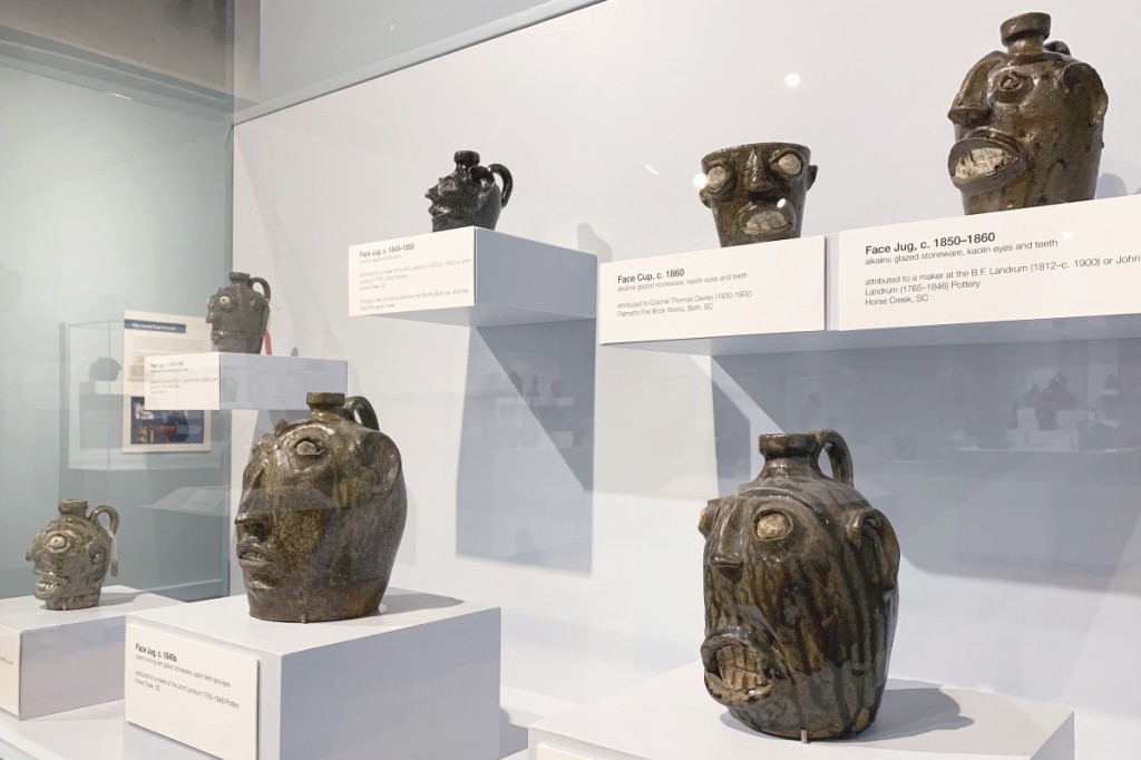 A selection of Edgefield face vessels is seen here together in the exhibit at the South Carolina State Museum. Image courtesy of the South Carolina State Museum.