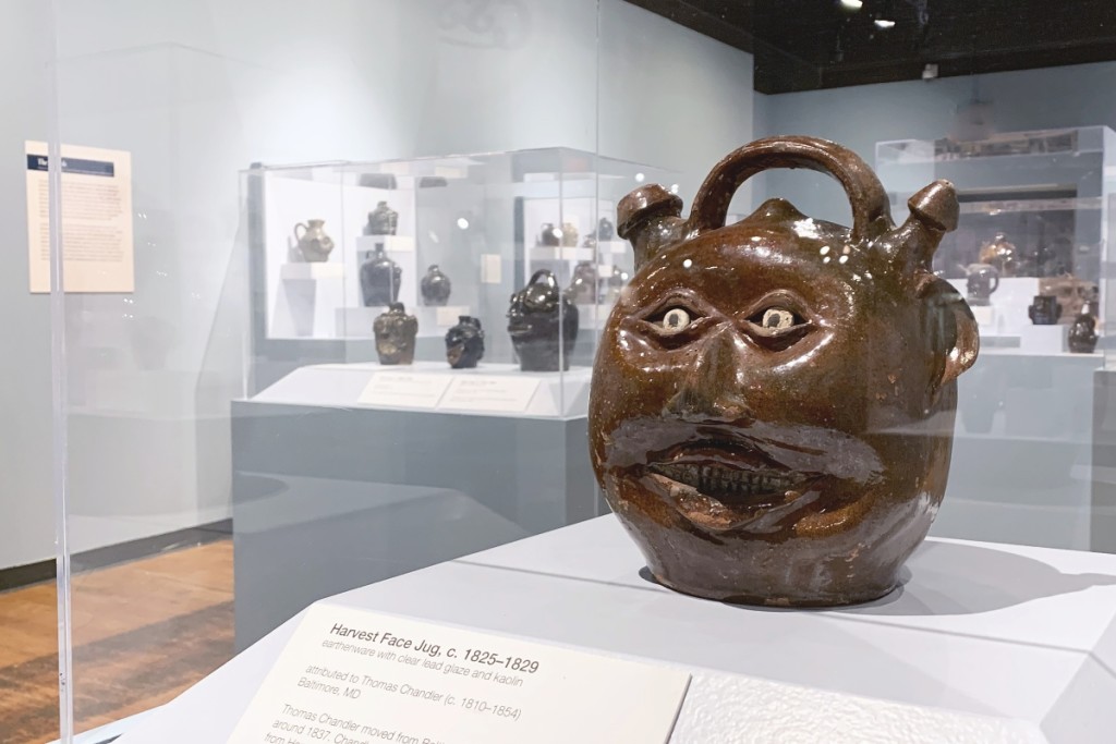 Seen here is the book’s cover image, a face jug attributed to   Thomas Chandler made some time between 1810 and 1854.   Earthenware with clear lead glaze and white painted details, 10 inches high. Image courtesy of the South Carolina State Museum.