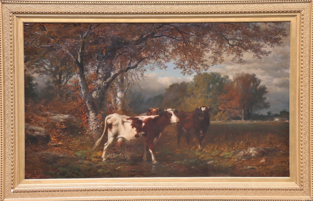“Cows in Pasture,” a monumental exhibition-sized oil on canvas by James McDougal Hart (1828-1901), went out at $7,400. Signed and dated 1881, the notable image of cows and pasture in a landscape scene stretched to 32½ by 55½ inches.