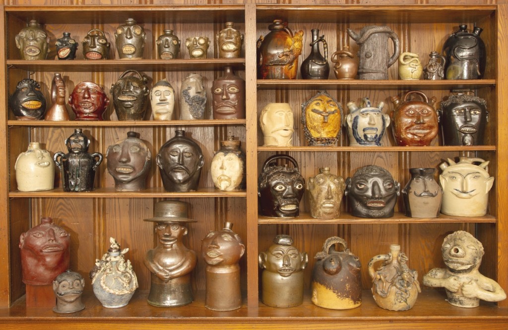 When at home, the Meyers enjoy their face vessel collection in these wood paneled shelves.