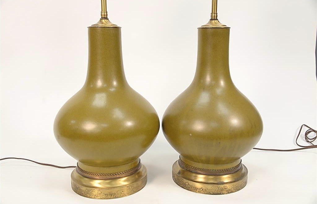 Surprising the auction house was this pair of Chinese glazed vases that had been drilled for lamps. They featured a mark to the bottom and the vases only measured 13 inches high. The pair sold for $26,670 on a $400 estimate.