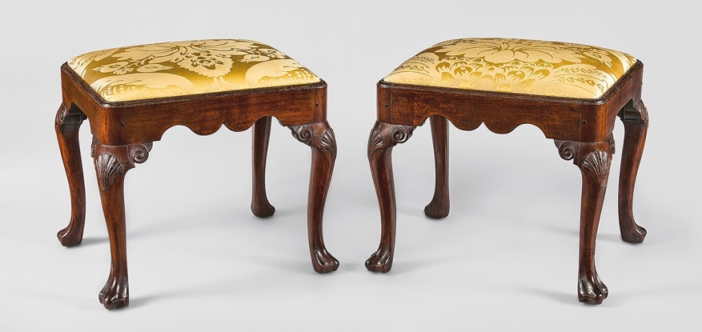 Stools, Philadelphia, 1740-45. Walnut, tulip poplar, yellow pine, replacement upholstery; 18½ by 20½ by 17½ inches. Promised gift of Leslie Miller and Richard Worley. These extraordinarily rare stools are from a group of walnut and mahogany furniture inherited or commissioned by the merchant Levi and Hannah Hollingsworth for their house at 16 Dock Street in Philadelphia.