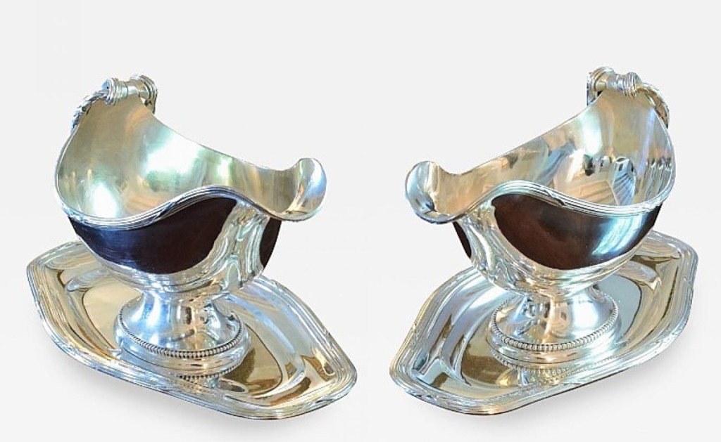 Silver Art by D&R was offering this pair of antique Nineteenth Century French silver sauce boats by Piault Linzeler with hexagonal undertrays. Marseille, France.