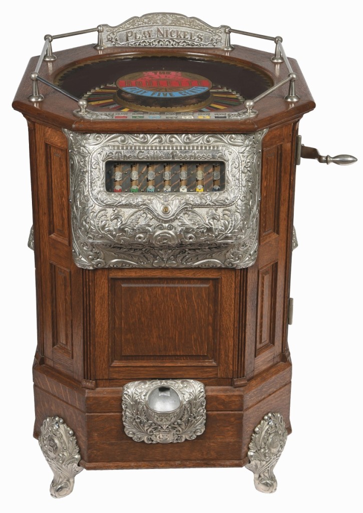 Rare Caille Bros. “Peerless Roulette” 5-cent floor model slot machine, circa 1904, rich oak case with decorative iron castings, seven coin-slots from which a player can choose, went out at $186,000.