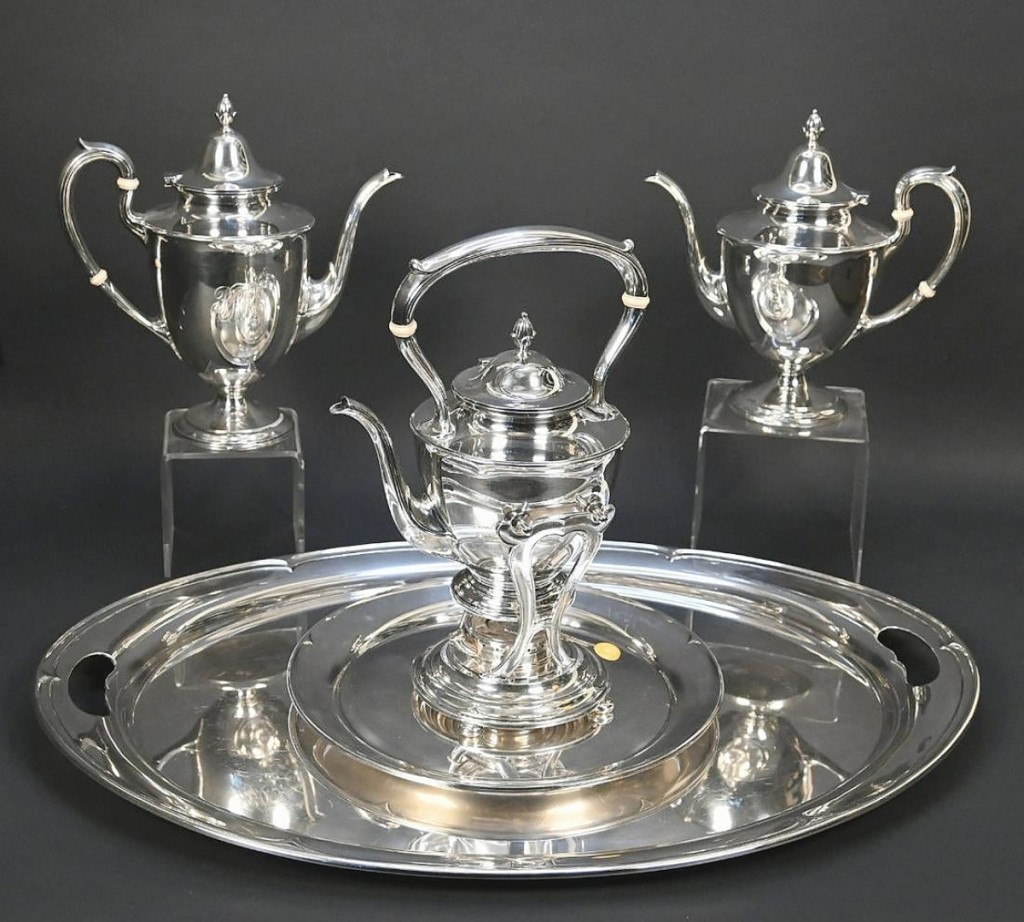 There was a strong selection of quality silver in the sale. This Gorham sterling partial tea/coffee service in the Dolly Madison pattern included the teapot, the coffee pot, a kettle on stand and two trays. The total weight was 254 troy ounces and it sold for $5,100.