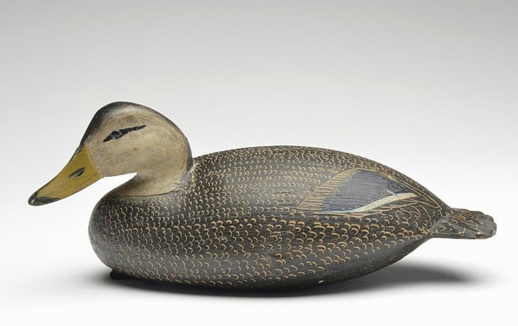 Prior to the sale, Jon Deeter said, “I think two of the Ira Hudson decoys we have may be the best he ever made.” One of those was this hollow carved black duck, with relief carved wing tips, and with the head and tail carved at an angle. It earned $54,000.