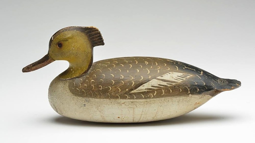 Two of the four highest priced decoys in the sale were made by Ira Hudson. This merganser hen, done in the first quarter of the Twentieth Century, realized $66,000.