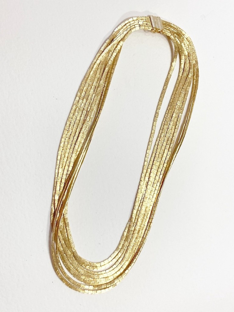 Leading the three-day event was this 18K gold Midcentury Modern multi-strand necklace that sold for $6,016.