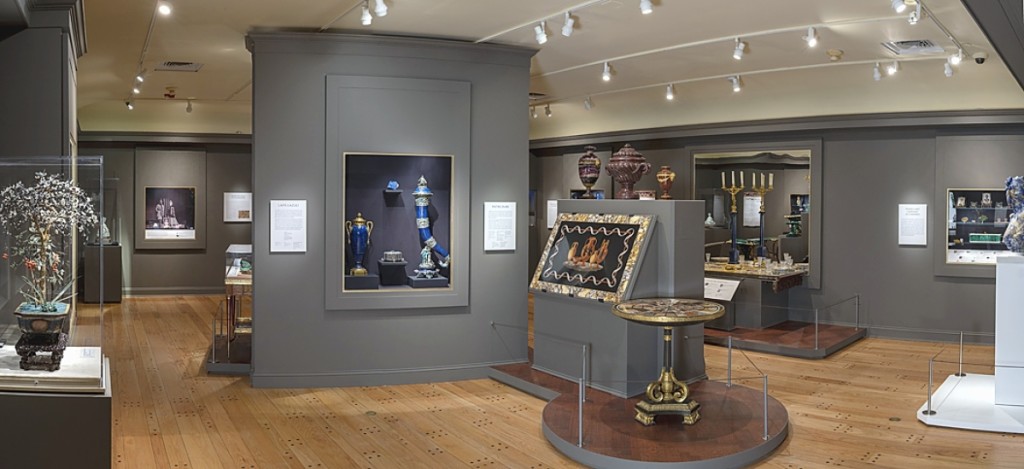 The “Natural Beauties” installation includes a showcase of deep blue lapis lazuli objects, including a Parisian potpourri vase, 1770s, and Viennese horn adorned with silver, enamel and pearls. On the shelf at upper right, the center covered vase was made in Paris during the 1780s from dark red porphyry.