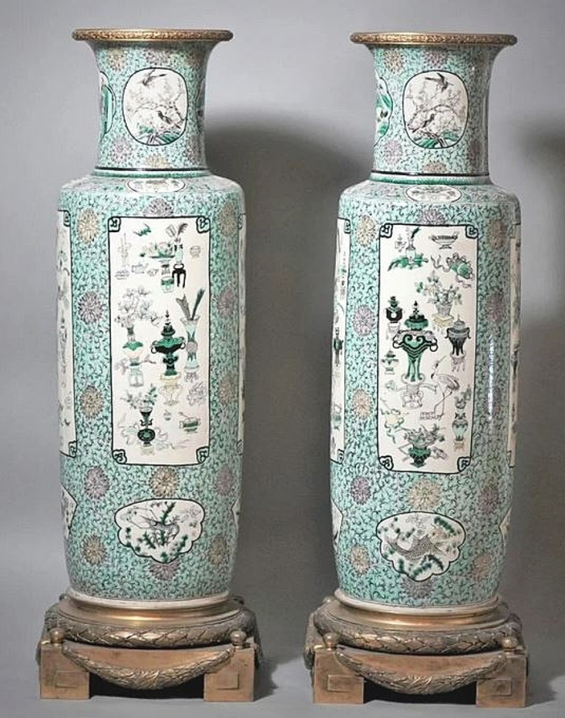 A pair of Chinese famille vert palace vases went out well above estimate for $9,088. The 31½-inch-tall examples were from the Guangxu period with later ormolu fittings. They are called “antiquities” vases for the decoration in the panels, which includes images of archaic bronzes and other vase forms.