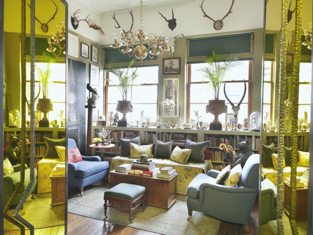 The Soho loft Jayne shares with his husband, Richmond Ellis, a food stylist and historian, is a laboratory for design ideas. Yellow mirrored doors open into a contemporary version of a connoisseur’s cabinet room filled with specimens and objets d’art. Photo Don Freeman.