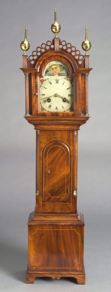 Miniature tall case clock, New England, circa 1800. Mahogany, white pine, glass, brass and steel.