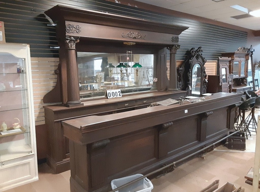 Leading the sale and selling to a phone bidder from Pennsylvania for $7,150 was this oak-back bar built in 1904 by M.J. Bernhard of Buffalo, N.Y. ($4/6,000).