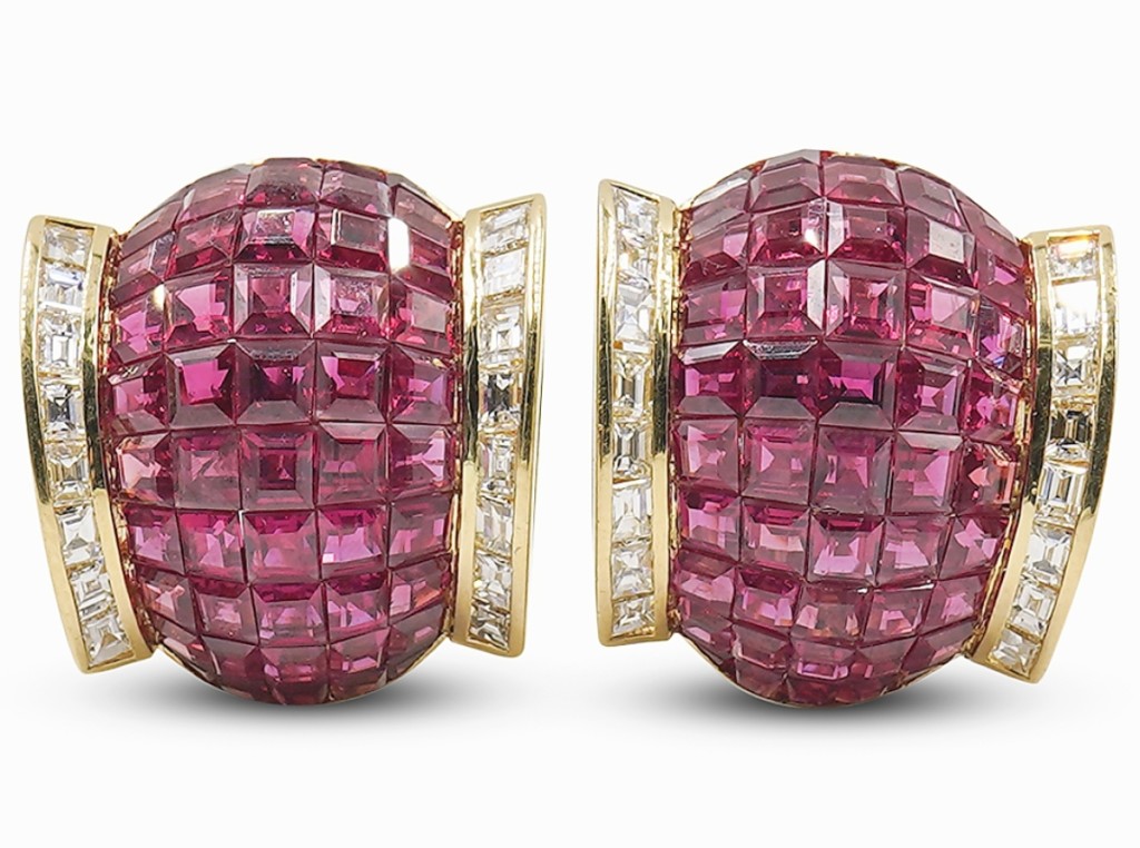 From France and circa Twenty-First Century, a Van Cleef & Arpels-style “Mystery Set” 18K and ruby earrings earned $4,690.