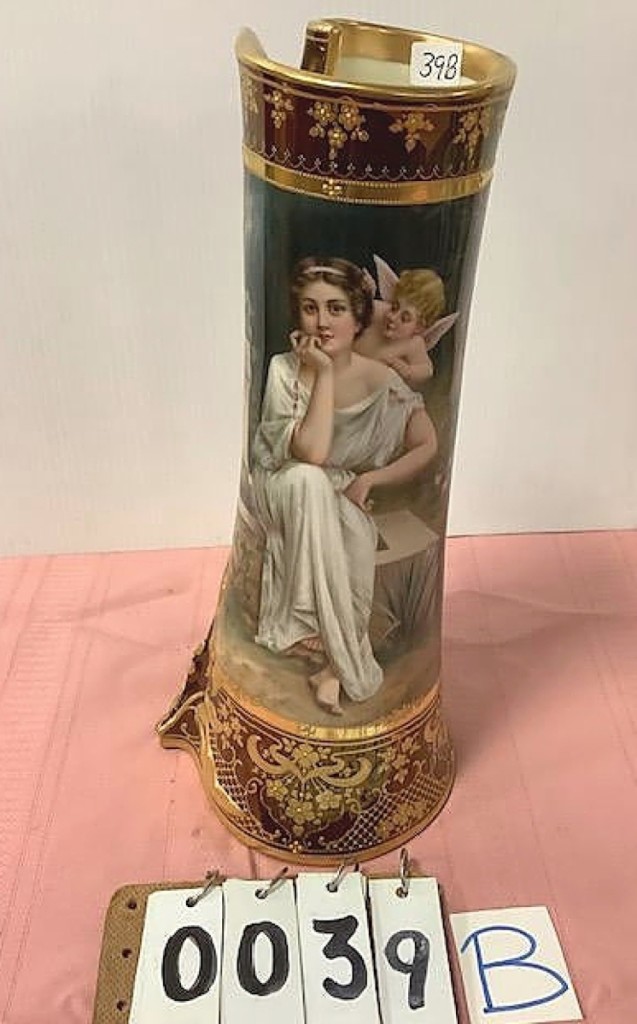 It was of unusual “wrapped” form but that did not deter bidders, who took this Royal Vienna parcel-gilt porcelain signed vase to $4,500. It was signed Waldesflustern on the bottom and dated to the 1890s ($500-$1,500).
