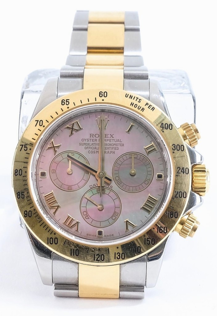 Bringing the top price in the sale was this men’s Rolex Daytona Cosmograph wristwatch, in 18K yellow gold and stainless steel with a mother-of-pearl dial, circa 2007-08. A private collector in the United States, bidding on the phone, took it for $15,470 ($12/16,000).