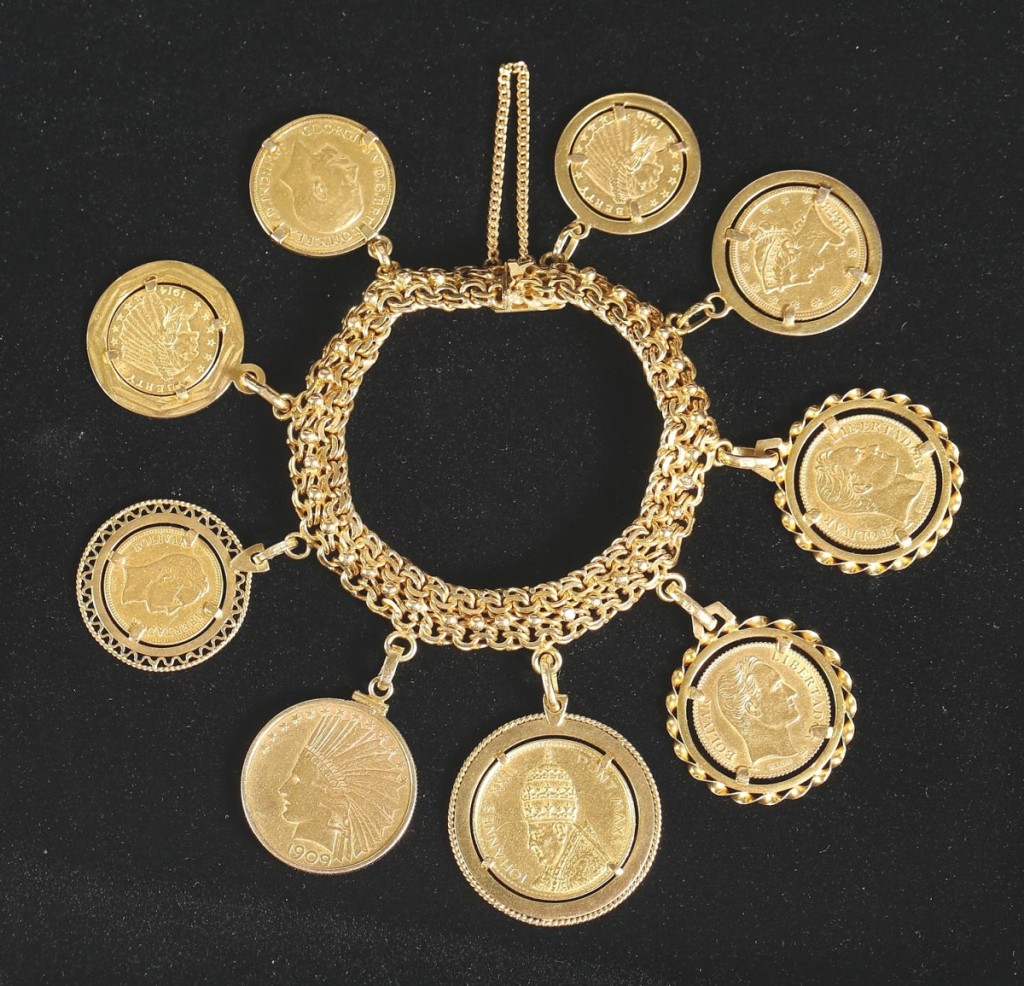 “As an auctioneer, you have to decide whether to take something apart and have the coins individually graded or to sell it intact. The consignor wanted us to sell it intact.” This gold coin charm bracelet with nine American and international coins realized $7,581, the second highest price in the sale ($ ,000).