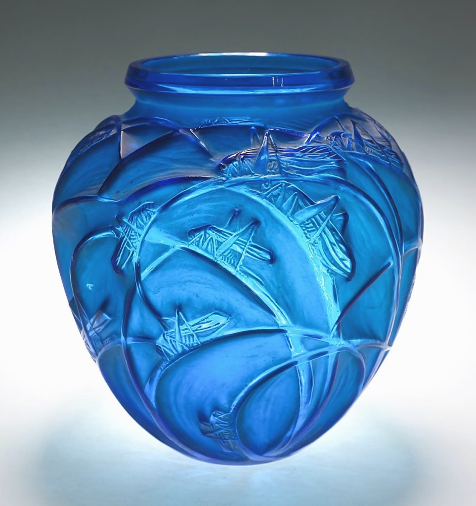 “People love the electric blue color.” Leading the sale was this electric blue and white stained “Sauterelles” vase by Rene Lalique, designed in 1912 and signed on the base. It finished at $10,626 ($3/6,000).