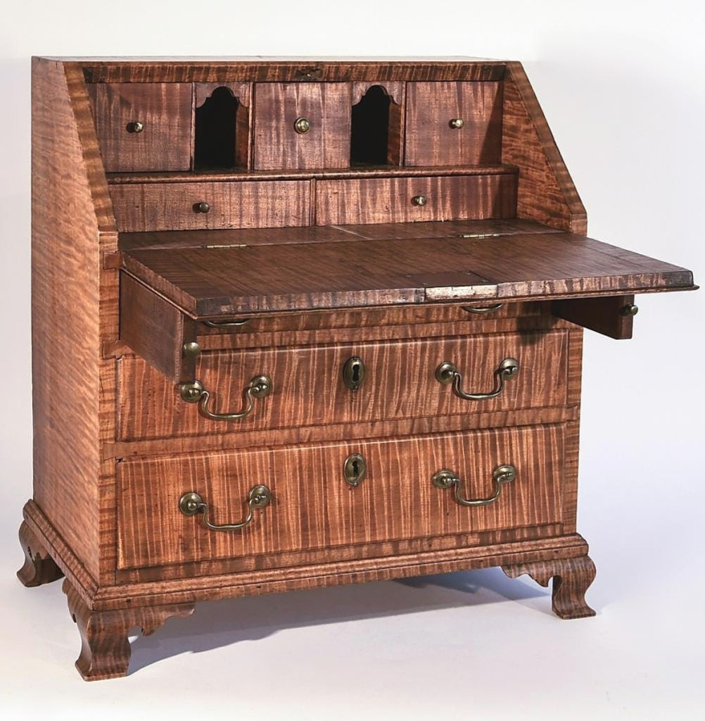 The weekend’s top lot was this miniature tiger maple slant front desk from the late Eighteenth or early Nineteenth Century that sold for $31,200 to a private collector. Though the piece was reduced in size, Giampietro said none of the quality was sacrificed and the grain was impeccable throughout the work. Wagner Collection.