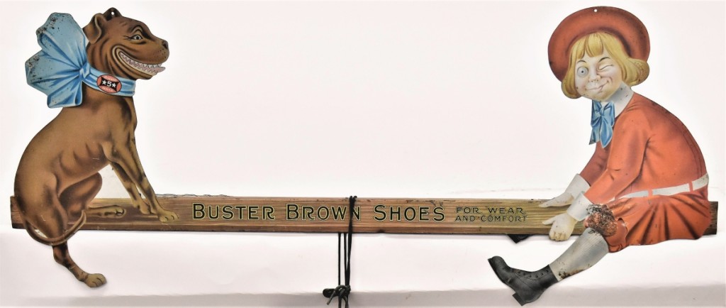 Teetering to the top of the trade signs in the sale was this Buster Brown Shoes chromolithographed example that took $4,640. The figure wears a real pair of leather black shoes and it measured 35 inches long.