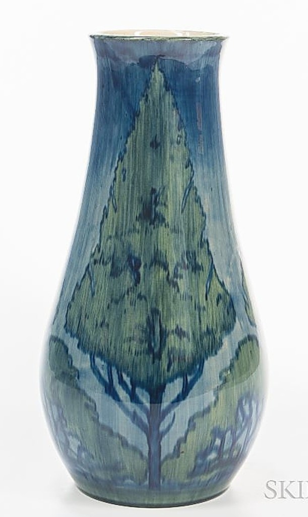 The sale’s top piece of pottery was this Newcomb Pottery vase by Olive Webster Dodd. It featured alternating tree designs and the firm said it was early, dating to circa 1900. It brought above estimate at $18,750.