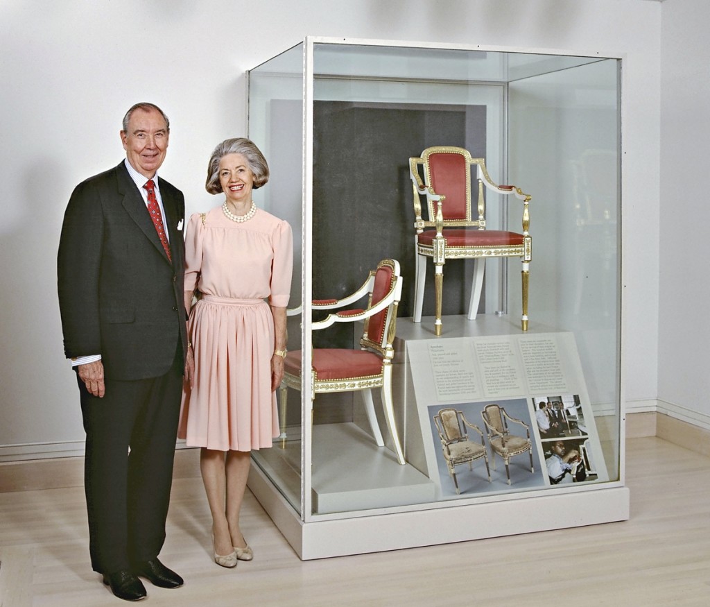 In this photograph of around 1993, the Hennages stand next to two recently conserved Philadelphia armchairs from their collection at the DeWitt Wallace Decorative Arts Museum.