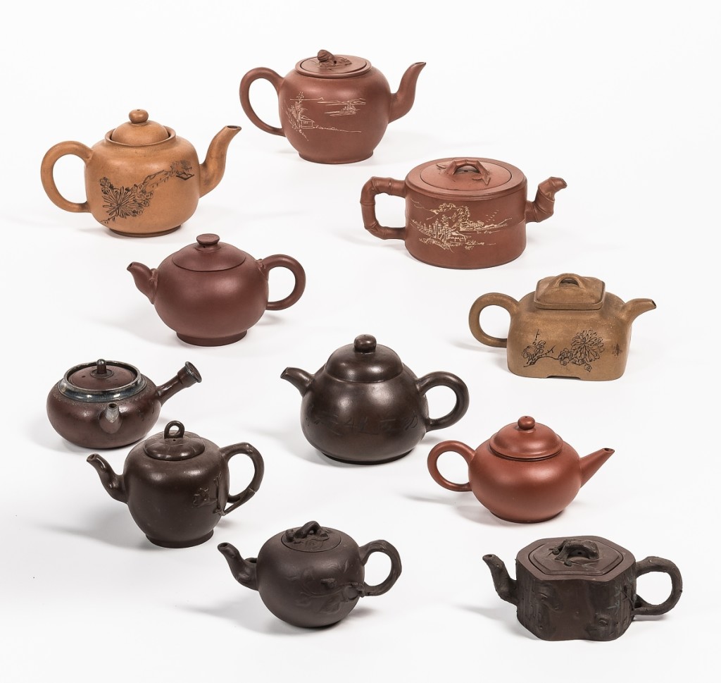 There were two lots of Yixing teapots. With 11 Nineteenth Century examples, one of which was silver-mounted, this lot sold for $5,938.
