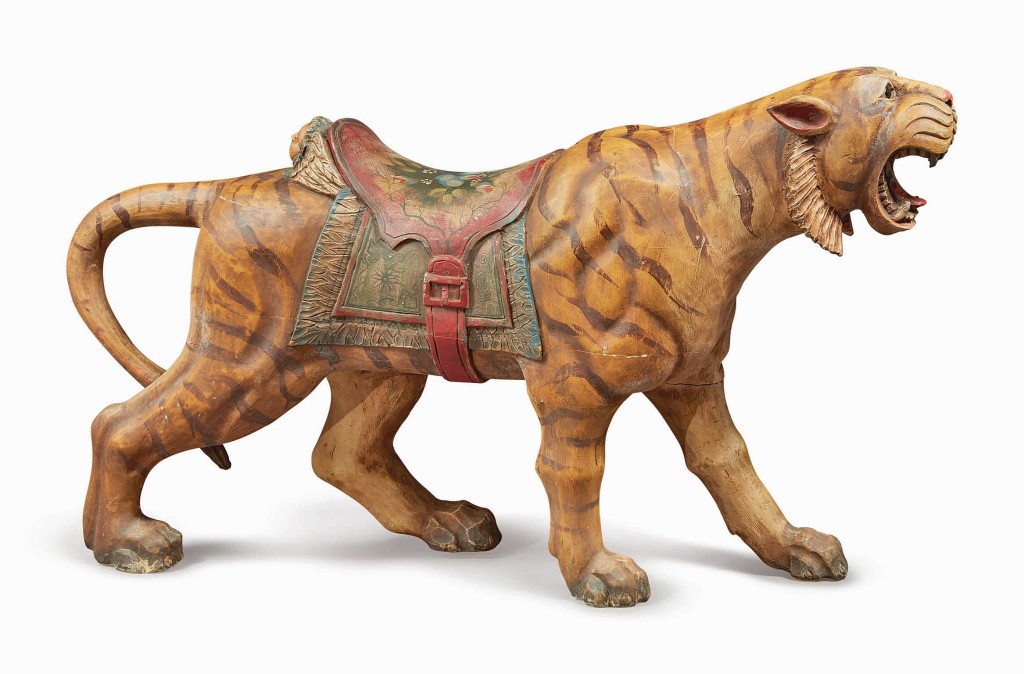 A carved and paint-decorated pine carousel tiger was made by the Philadelphia Toboggan Company. The auction house dated it to circa 1905, a year after the company’s founding. The Philadelphia Toboggan Company would produce 94 carousels in its 30 year tenure, though it only made six tigers. This example sold for $37,800.