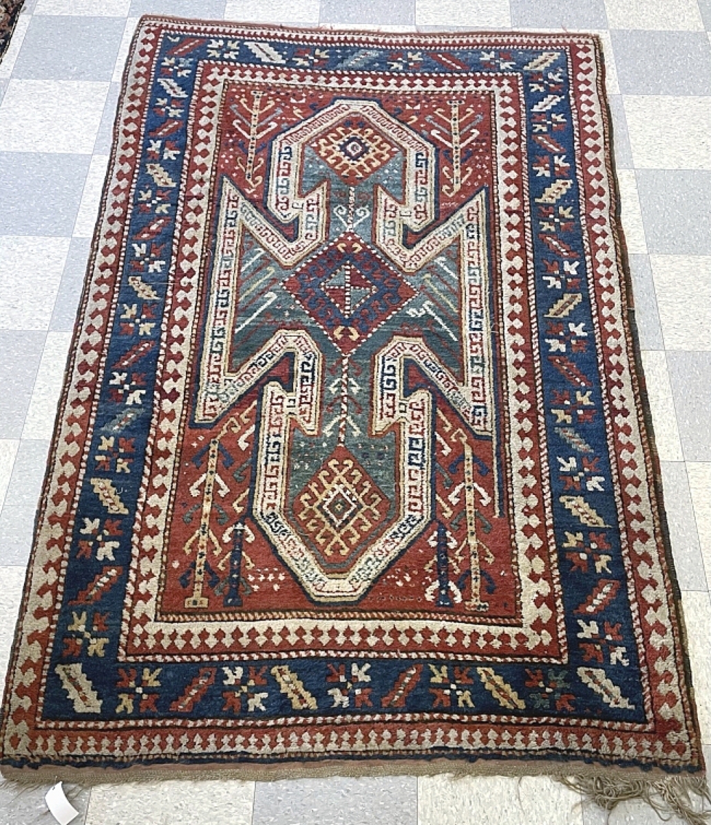 Included in the sale were an assortment of Oriental rugs that had seen foot traffic in Camp Manor. Leading all was this hand-woven Oriental area rug, 50 by 90 inches, in good overall condition and colors, which sold for $11,500.
