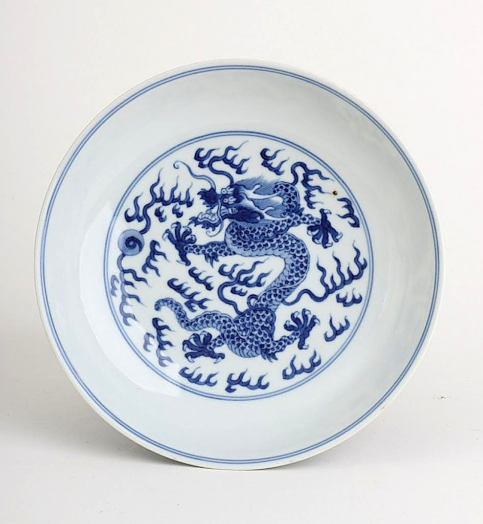 Surprising prices were attained for a couple of Chinese porcelain bowls. This imperial Jiaqing bowl, 1796-1820, with a solitary writhing dragon in the basin and dragons surrounding the outside, surpassed its $200/400 estimate to finish at $11,160.